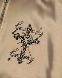 JESUS TAT ZIP HOODIE [SANDSTONE]